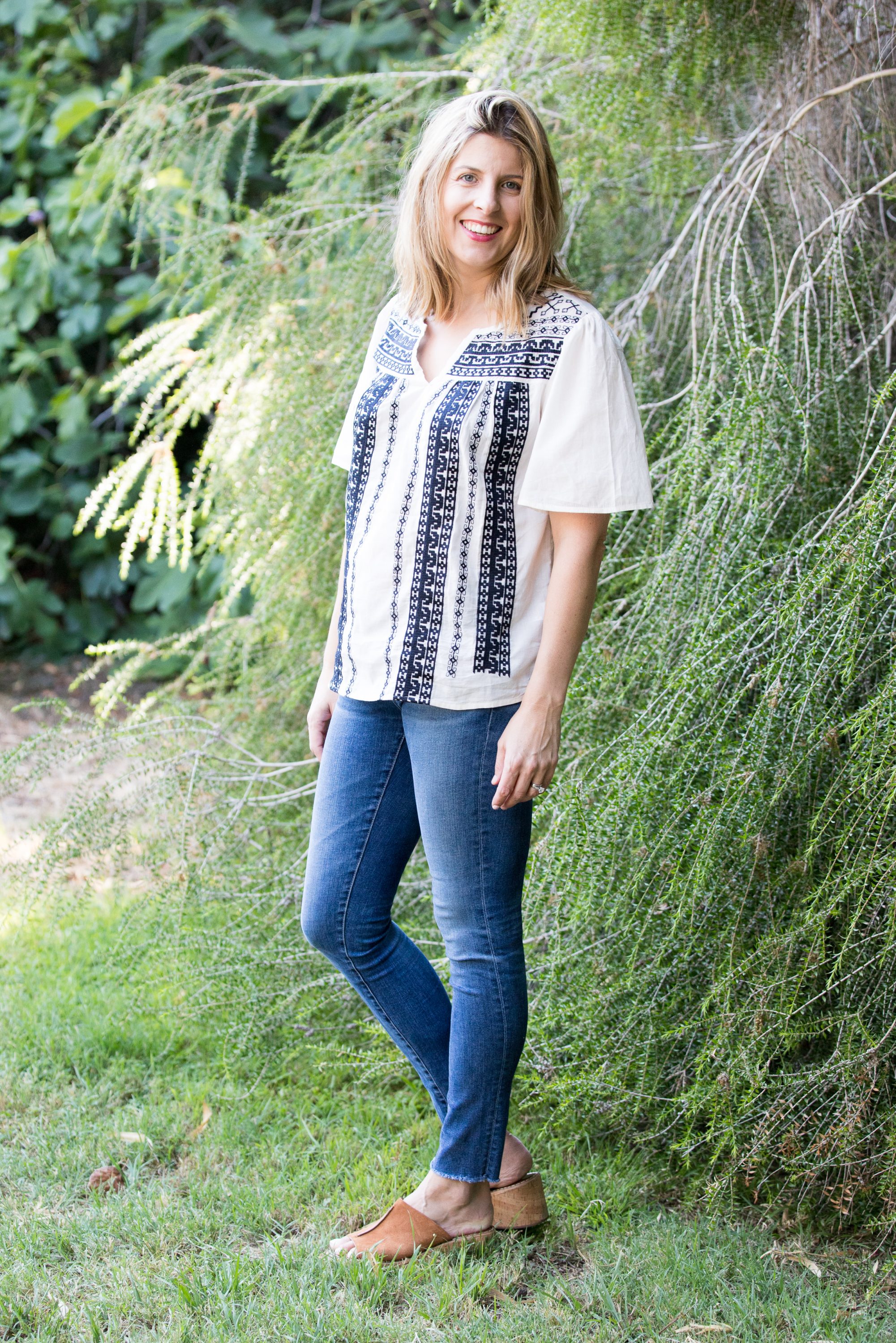 blue and ivory embroidered top